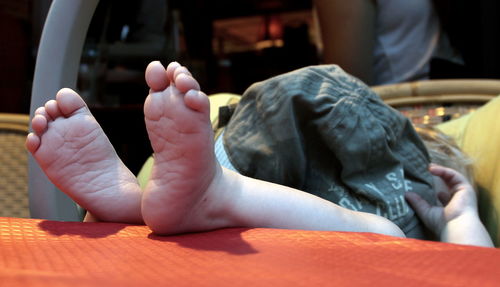 Low section of baby feet