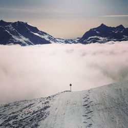 Scenic view of snowcapped mountain against sky