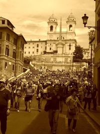 People walking in front of church