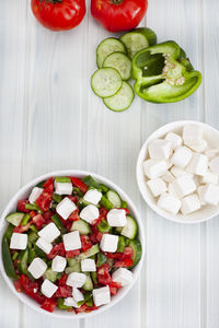 Bulgarian shopska type salad with tomato, cucumber, peppers and feta cheese