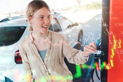 Young woman using mobile phone