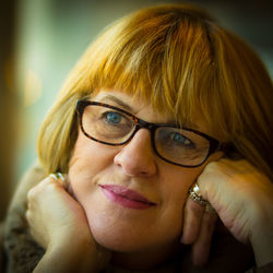 Close-up of thoughtful woman wearing eyeglasses