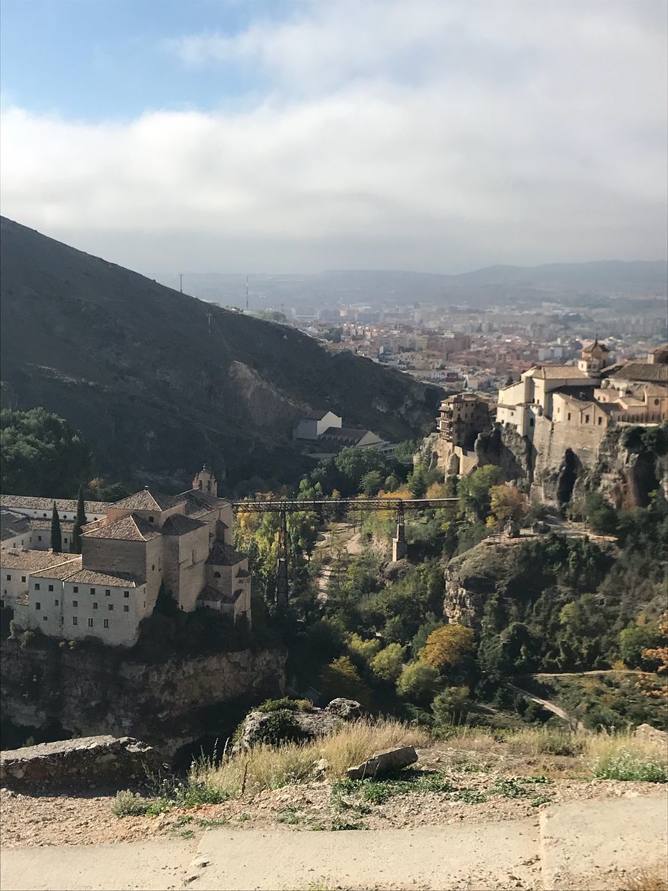 architecture, mountain, building exterior, history, built structure, castle, no people, day, travel destinations, ancient, sky, outdoors, landscape, tree, nature