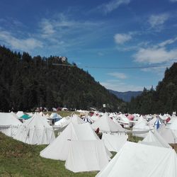 Panoramic shot of tent on landscape against sky