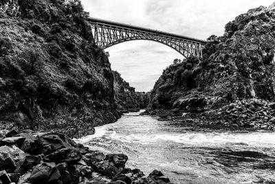 Arch bridge over river