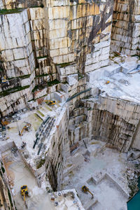 High angle view of water flowing through rocks