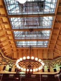 Low angle view of illuminated ceiling