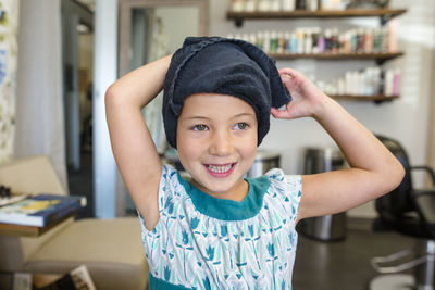 Portrait of a smiling girl at home