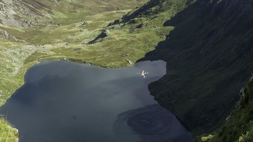 High angle view of sea and mountains