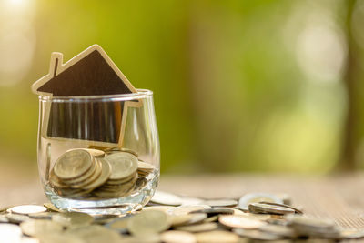 Close-up of coins on table