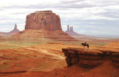 Lone cowboy in the monument valley