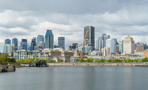 Modern buildings in city against sky