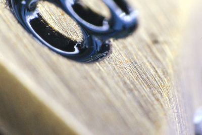 Close-up of metallic object on table