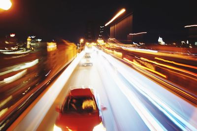 Light trails on road at night