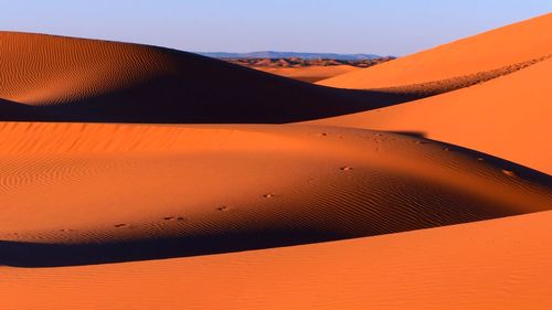 Scenic view of desert against sky