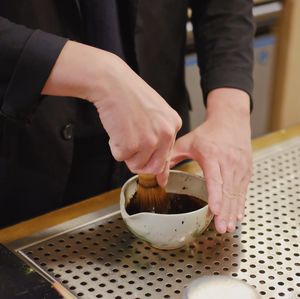 Close-up of hand holding ice cream