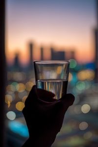 Close-up of hand holding drink