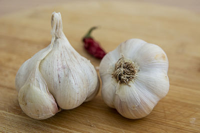 Close-up of garlic on table