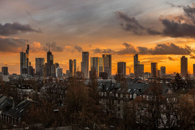 Cityscape against sky during sunset