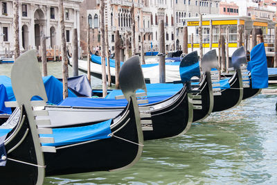 Boats moored in canal