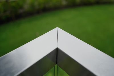 High angle view of white container on grass