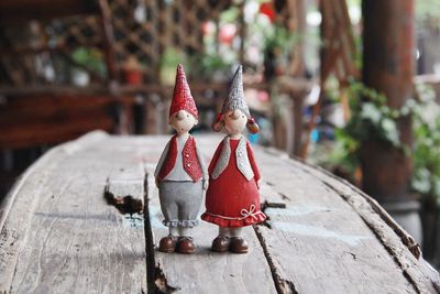 Figurines on wooden table