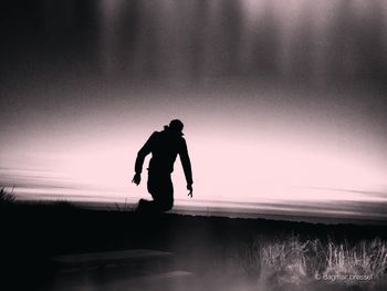 Full length of a woman standing on beach