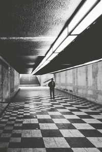 Full length of woman walking on walkway