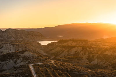 Scenic view of mountains during sunset