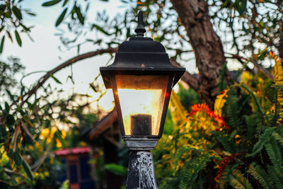 Low angle view of lantern on street light