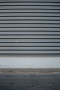 Metal grate on wall