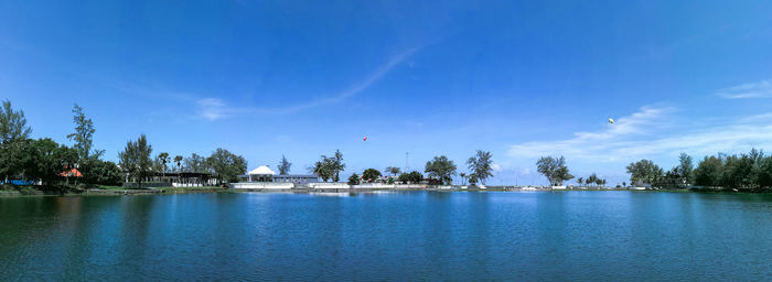 Scenic view of lake against blue sky