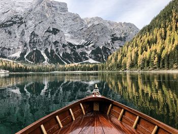 Scenic view of lake by snowcapped mountains