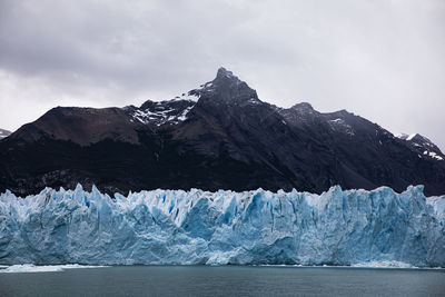 Scenic view of snowcapped mountain against sky