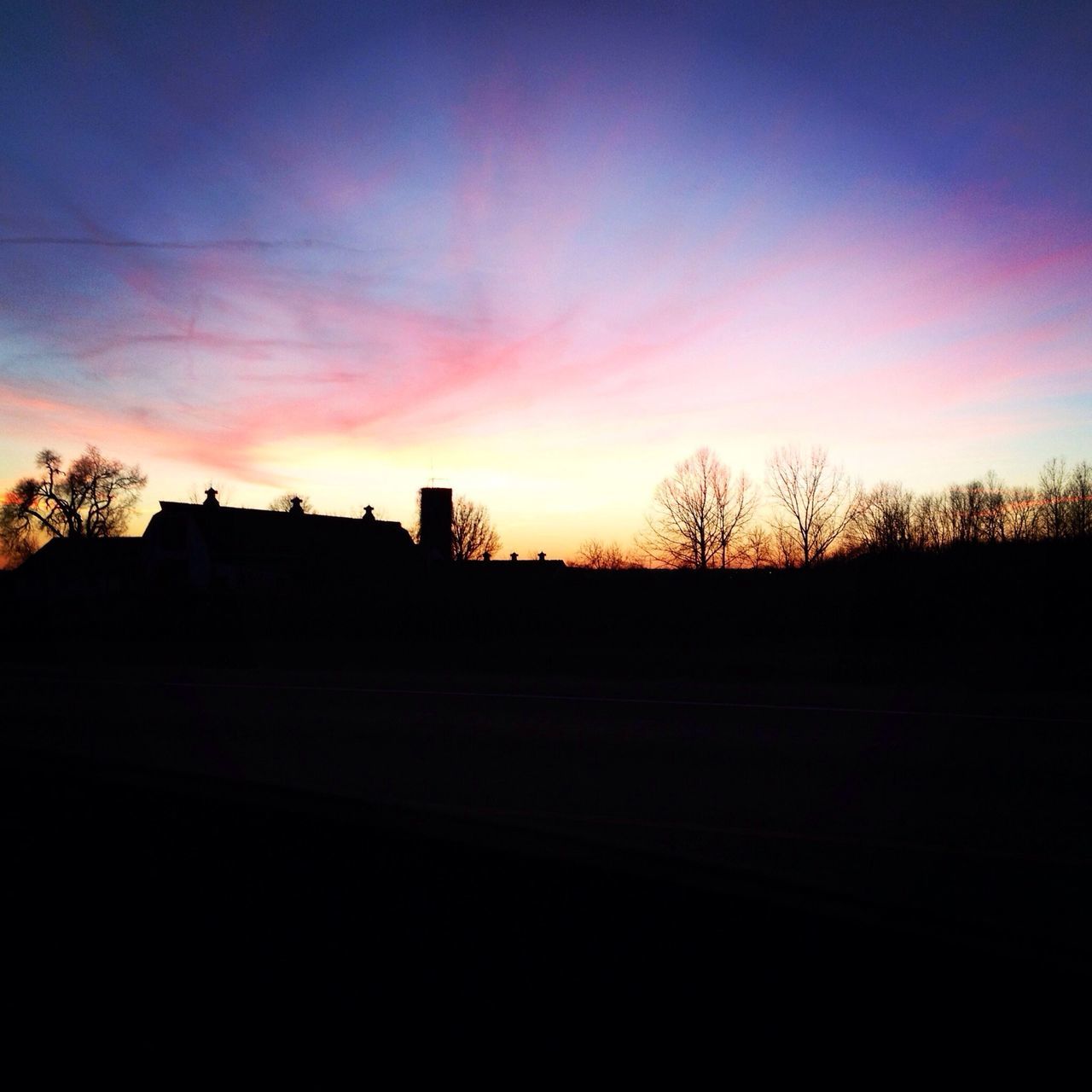 sunset, silhouette, built structure, sky, tree, architecture, building exterior, orange color, dark, scenics, tranquility, copy space, landscape, tranquil scene, beauty in nature, nature, house, no people, outdoors, dusk