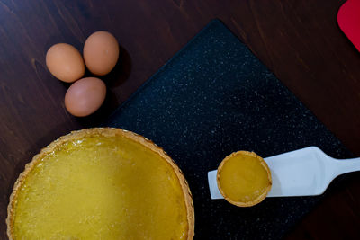 High angle view of eggs in container on table