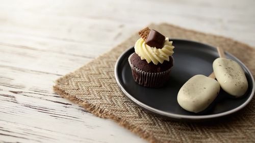 Close-up of cupcakes on table