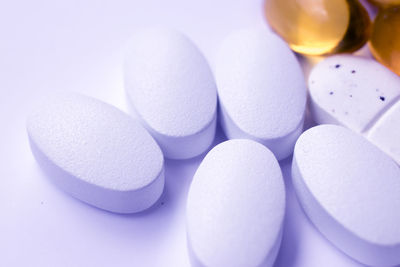 High angle view of medicines over white background