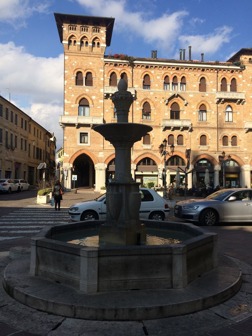 STATUE IN FRONT OF BUILDING