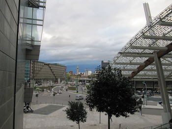 Buildings in city against sky