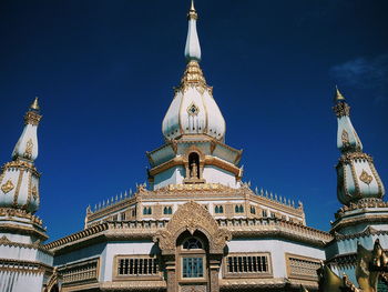 Low angle view of building against blue sky