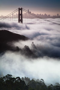 View of suspension bridge in foggy weather