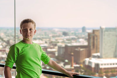 Woman looking at cityscape