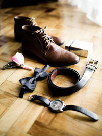Personal accessories on wooden floor