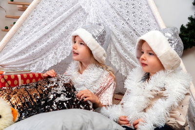 Portrait of mother and daughter in winter