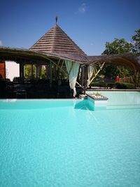 View of swimming pool against blue sky