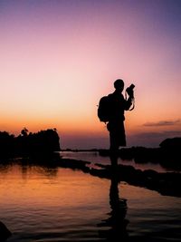 Scenic view of sea at sunset