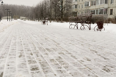 Bicycle on snow covered city