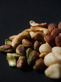 Close-up of peanuts against black background