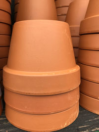 Close-up of stack of flower pots on table